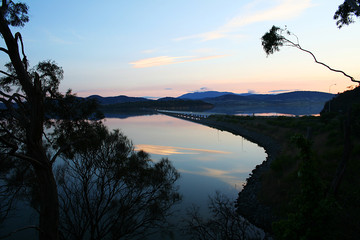 Reflections of clouds on the lake in the early evening. Tasmania.