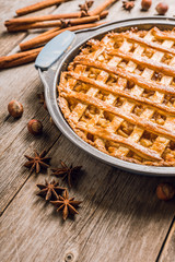 Freshly baked autumn apple pie with cinnamon. Selecive focus. Shallow depth of field.
