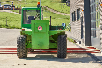 Green Lifting Engine Parked At Mountain Ski Resort