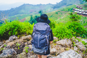 woman backpacker travel on mountain