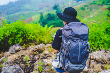 woman backpacker travel on mountain