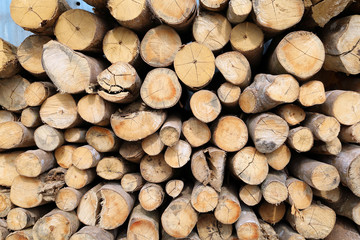 Wood long timber stack for charcoal factory background