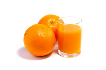Orange juice in glass with two fresh orange. isolate on white