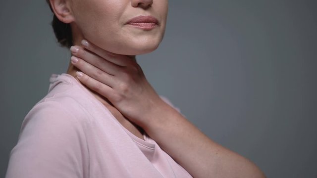 Female suffering from sore throat, problem with swallow, pharyngitis tonsillitis