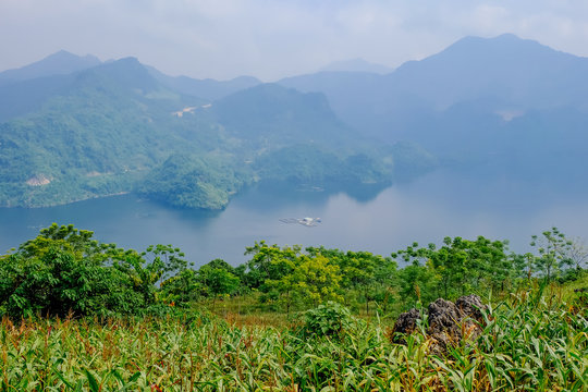 Beautiful landscape of lake in a countryside Vietnam. A view on top of mountain. Royalty high quality stock image of nature landscape.