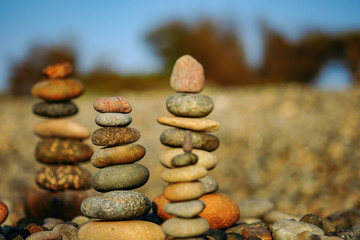 Fototapeta na wymiar Close up of rocks stacked one on top of another with soft selective focus and blurred rocks background. High quality free stock images of rocks.