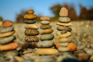 Fototapeta na wymiar Close up of rocks stacked one on top of another with soft selective focus and blurred rocks background. High quality free stock images of rocks.