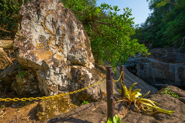 King Rama VI name engraved on the rock at Than Mayom Waterfall in Ko Chang, Trat 