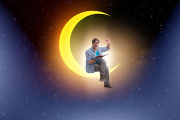 Obraz na płótnie Canvas Student reading book on the moon crescent