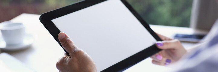 Businessman holding tablet in hand in cafe white screen lifestyle
