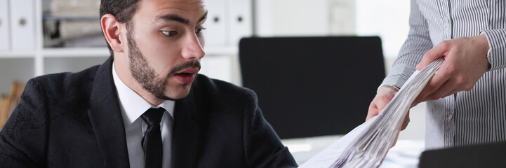 businessman have lot of work with documents. He rush have no time