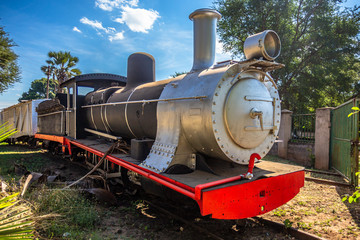 Fototapeta na wymiar Old retro preserved locomotive train standing on the rails in Livingstone, Zambia