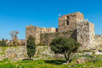 Fototapeta na wymiar Gibelet old crusader castle walls and towers in Byblos, Lebanon