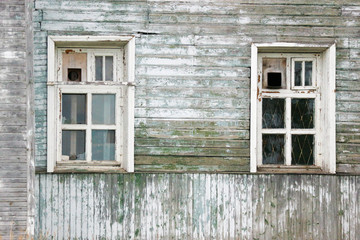 window in an old shabby house in dying city