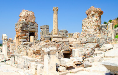 Turkey, Aegean, Izmir. Ruins of ancient Greek city Ephesus (Efes). Columns of white marble, destroyed buildings. Famous open-air museum. Popular tourist location. Selective focus.