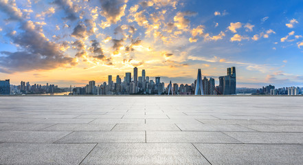Empty square floor and modern city skyline in chongqing at sunset,China.