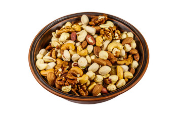 Bowl with mixed nuts isolated on white background. Walnuts, pistachio, almond, peanut, cashew, hazelnut in ceramic bowl