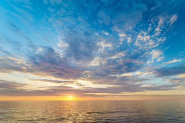 Sky background on sea shore sunset.