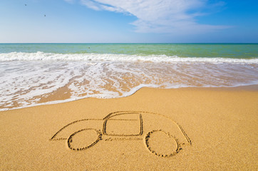 Draw car on beach sand.