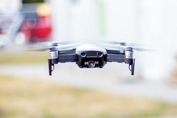 Drone in flight. Flying quadcopter.