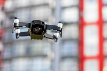 Drone in flight. Flying quadcopter.