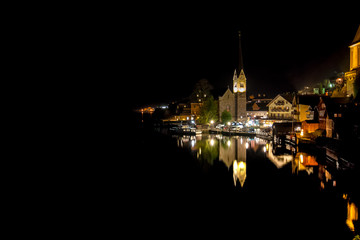hallstatt church night view reflection