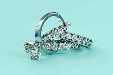 Interwoven diamond rings on turquoise background