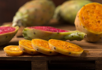 cactus fruit over wooden background