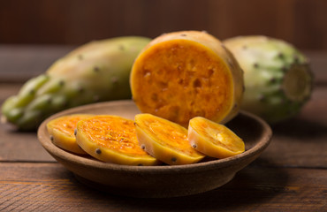 cactus fruit over wooden background