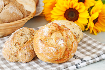 Buns and breads on breakfast table.