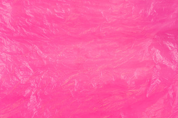 Fototapeta premium Wall surface plastic texture. Abstract background with pink shapes in top view.