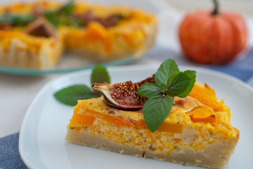 home made pumpkin quiche lorraine on a table