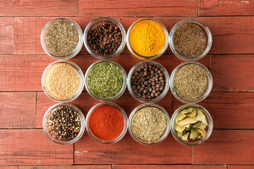 Various kinds of spices in bowls. Big collection. Top view