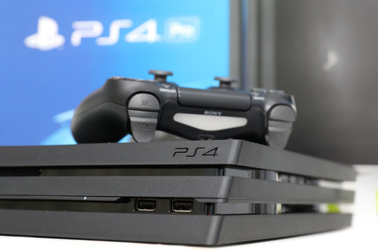 BANGKOK, THAILAND - JANUARY 15, 2017:The New Sony Dualshock Controller with PlayStation 4 Pro on January 15, 2017. in Bangkok Thailand.