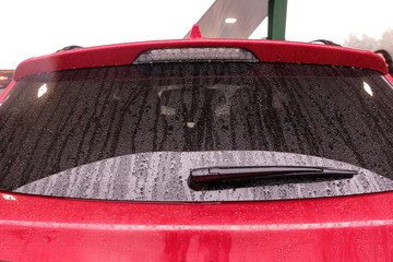 rainy day, view of a rear window of car