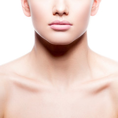 Lips, part of beauty face of young woman with perfect skin, nude natural make-up. Body care skincare facial treatment concept