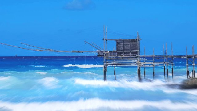 motion blur effect sea waves fishing shack