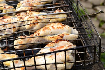Chicken legs (Shin) fried on the grill on the grill