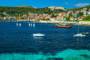 Adriatic waterfront with fishing boats and historic buildings, Hvar, Croatia