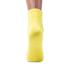 back view of yellow socks on an isolated white background