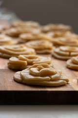 Hungarian home made pastry called rózsafánk rose pastry before frying 