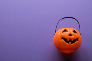 halloween pumpkin on lilac background