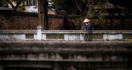 woman in vietnam cleaning