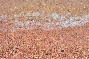 Fototapeta na wymiar Sea or ocean waves on a stone coast beach