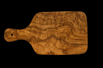olive wood cutting board isolated on black