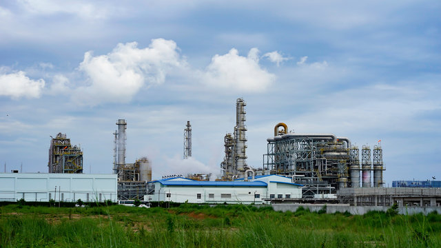 Industrial oil refinery plant form industry zone with  blue sky,oil storage tank , factory equipment industry