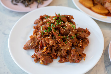 Fototapeta premium Fried pork(Bulgogi) with spicy korean sauce