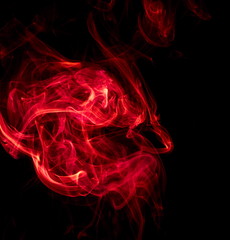 Red smoke on black background