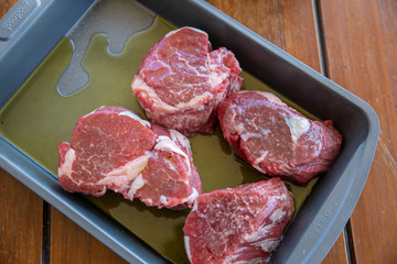 Fresh raw steak beef with olive oil