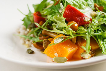 salad with persimmon on the white